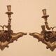 Pair of antique wall sconces in gilded wood from the 19th century.