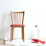 Bistro chair with bars of the 50s in wood and imitation red leather