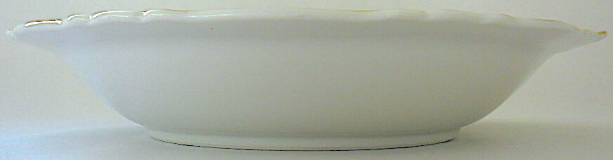 Hollow dish in white porcelain, golden lip.