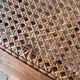 Piano bench seat in cane