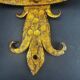 Pair of electrified golden wrought iron gothic wall sconces.