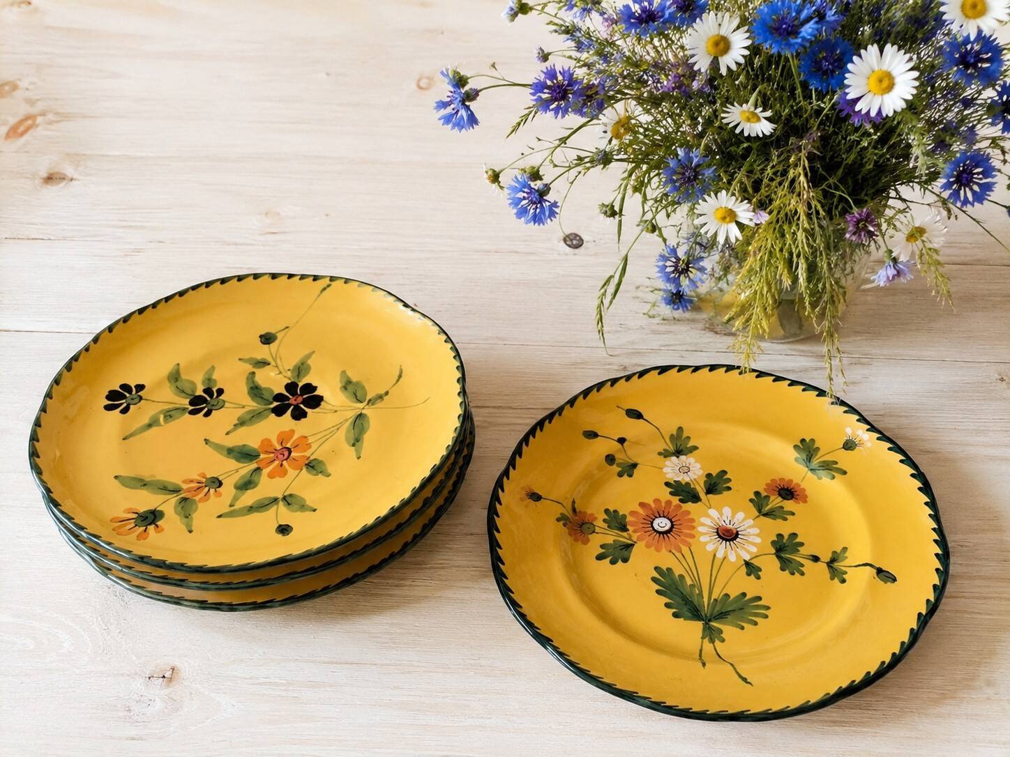 4 antique plates in hand-painted faience