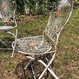 Ancient folded garden lounge in cast iron