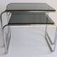 Tubular steel and smoked glass side tables, set of 2