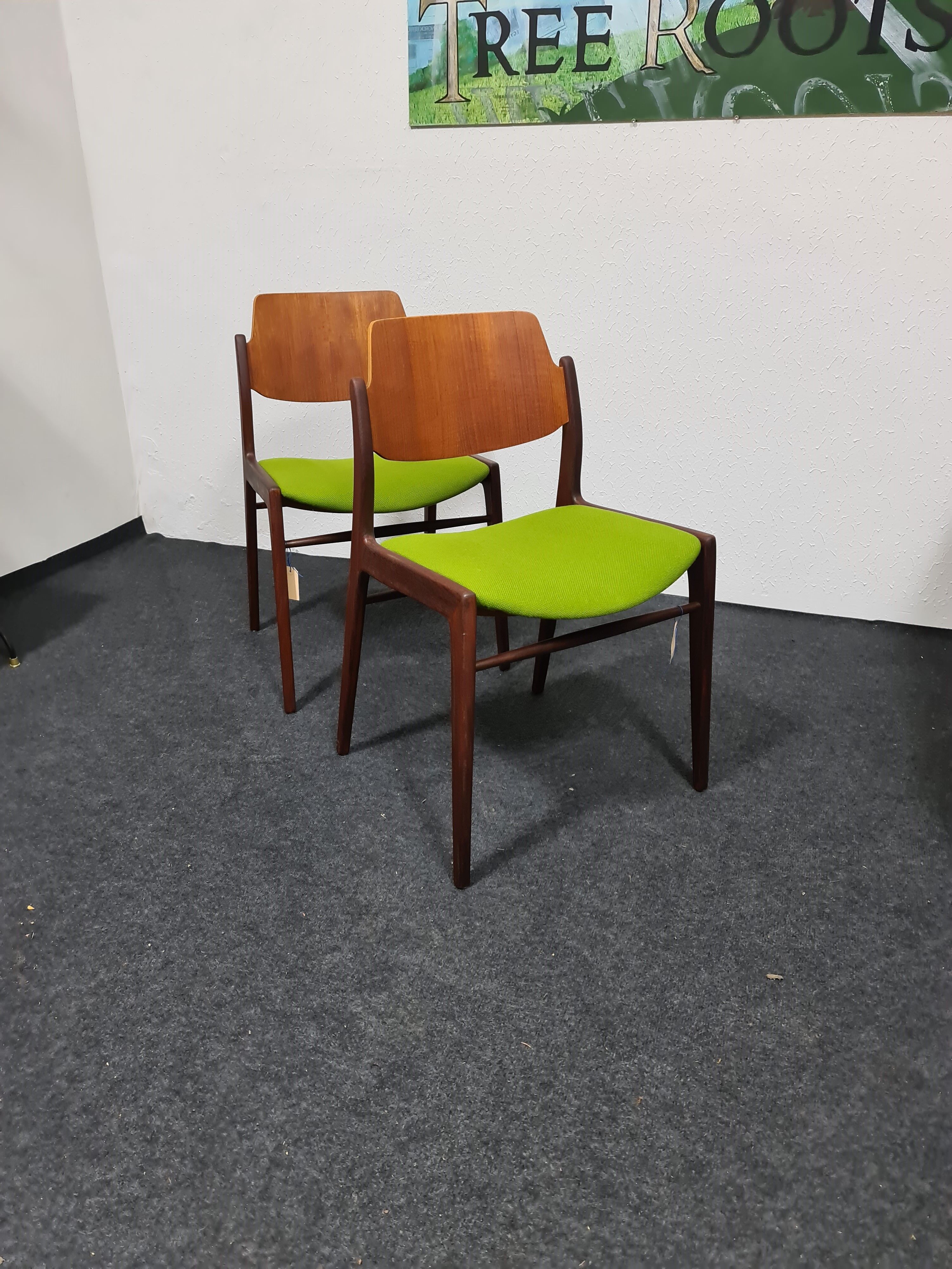 Two vintage teak dining chairs