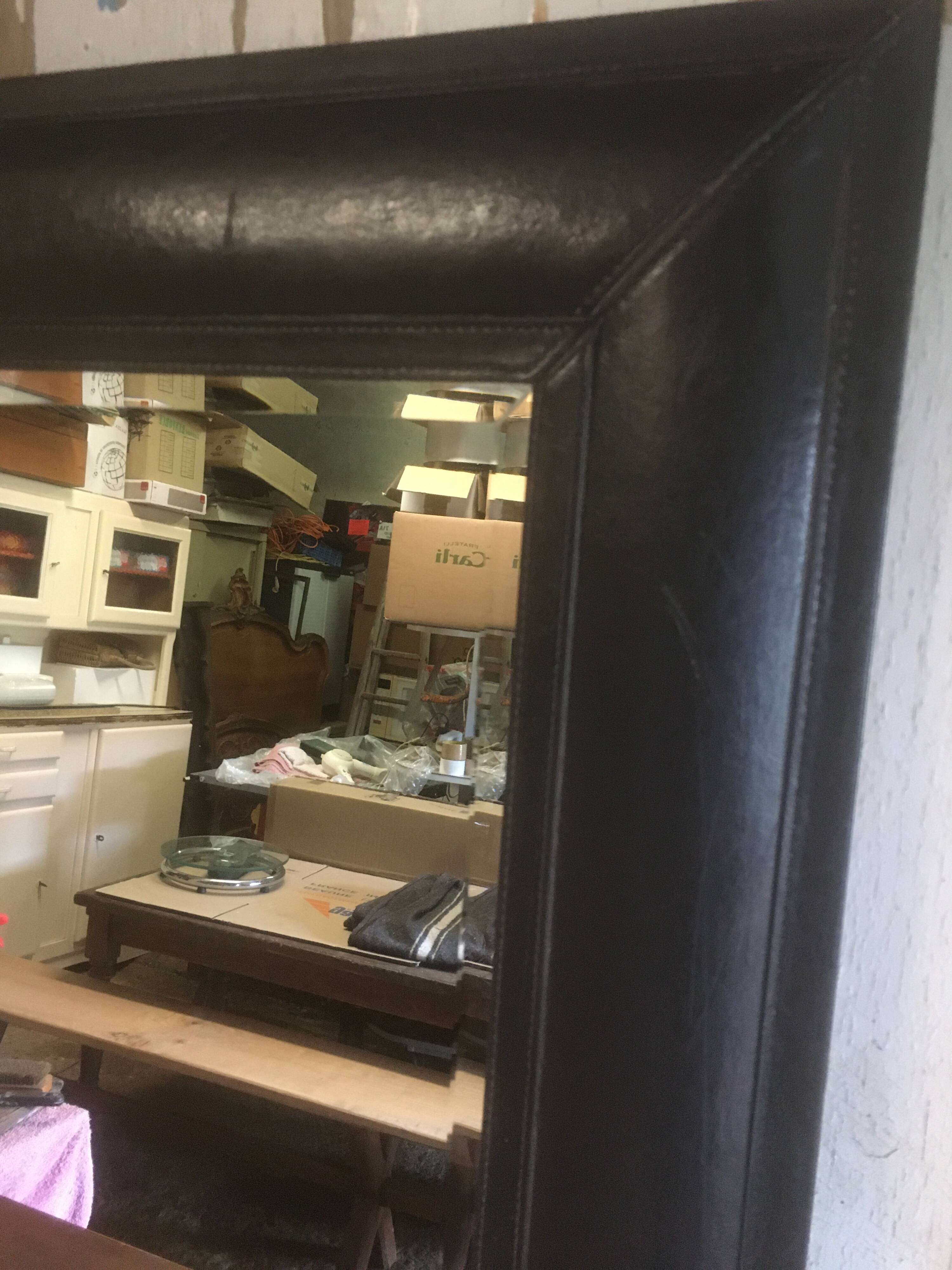 Beveled leather mirror 90x70