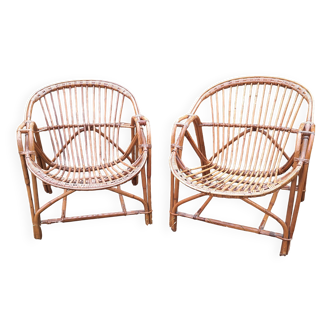 Paire de fauteuils "corbeille" bambou et rotin