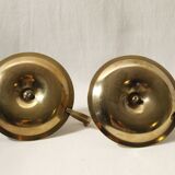 Set of 2 round golden metal candle holders and floral patterns