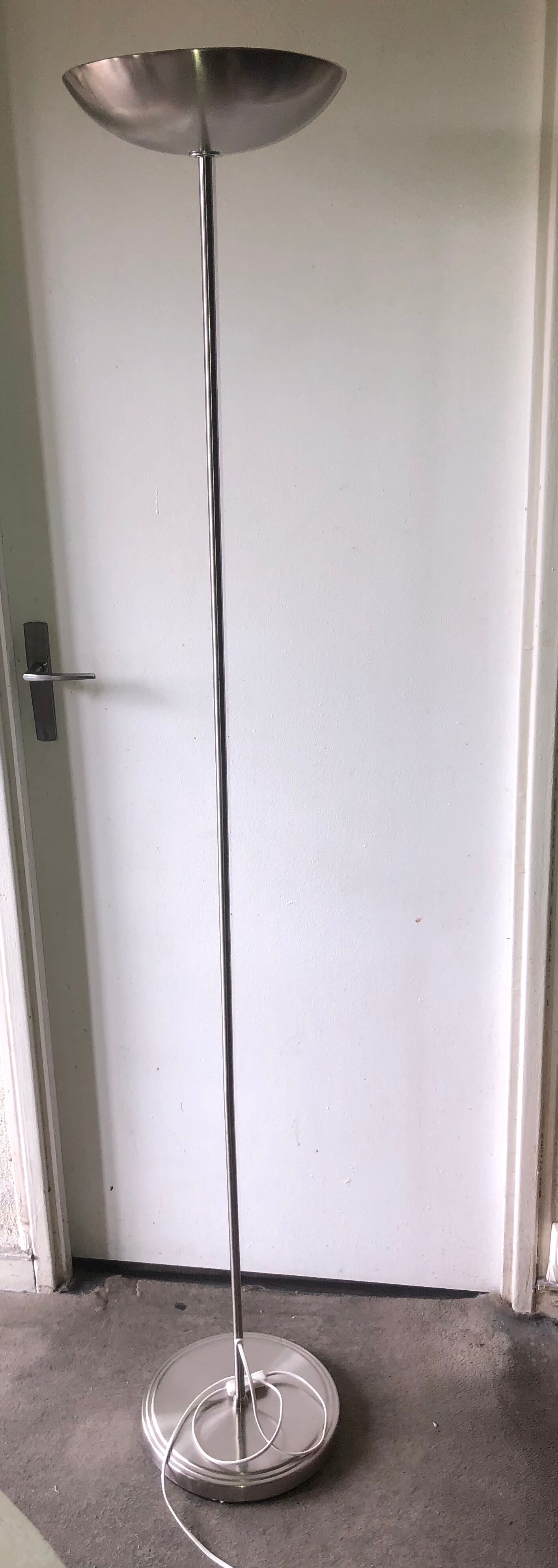 Discreet brushed metal floor lamp