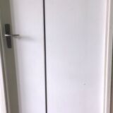 Discreet brushed metal floor lamp
