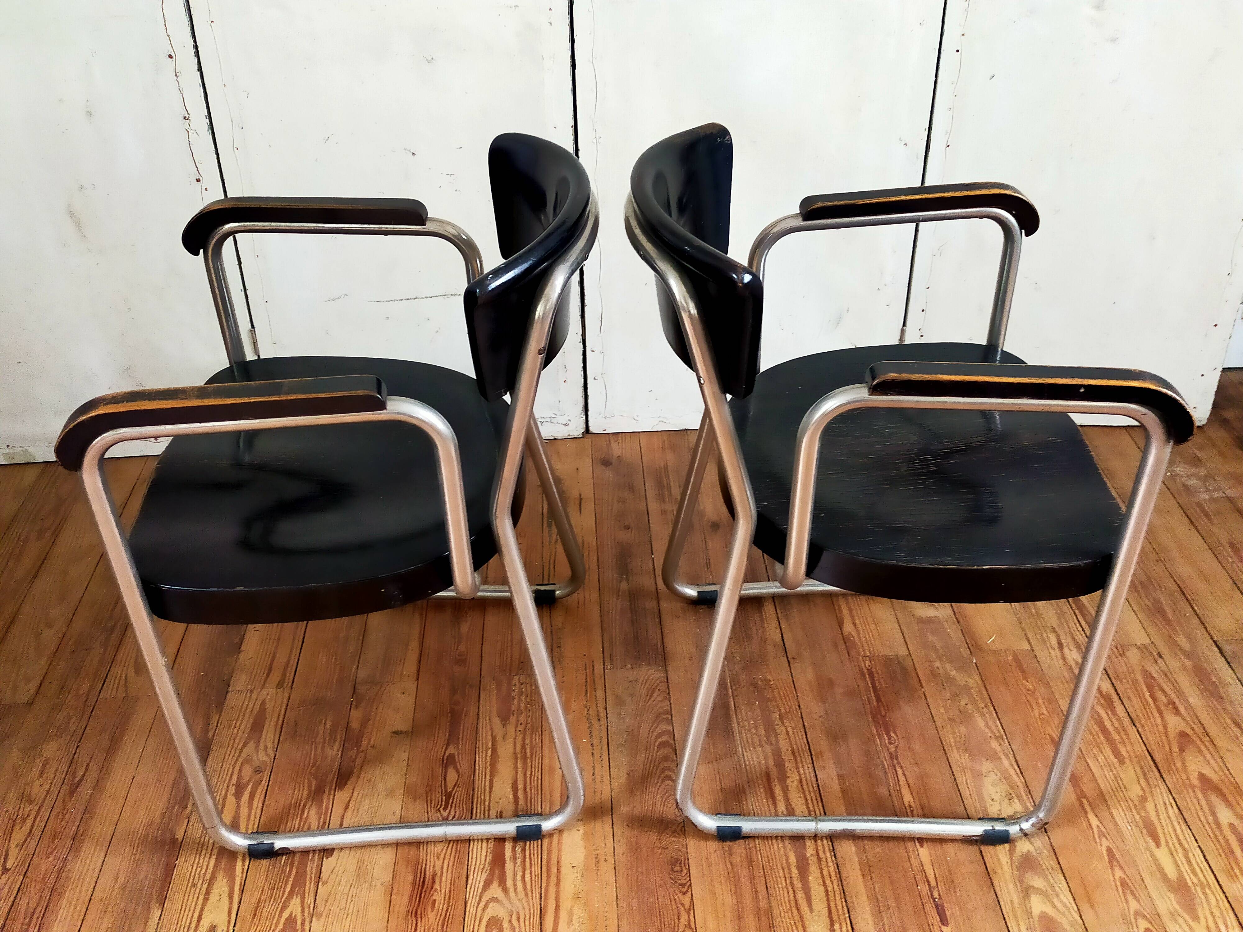 Pair of armchairs by Emile Guilhot edited by Thonet.