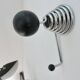 "Streamline" wall coat rack in chromed metal and black lacquered wood, 1970.