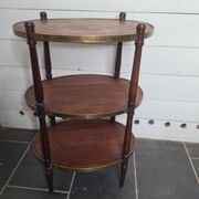 Oval mahogany side table has 3 floors
