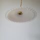 Serrated opaline suspension