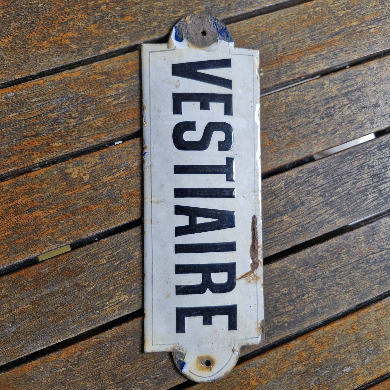 Enameled “locker room” plaque