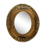 Small old mirror in gilded wood
