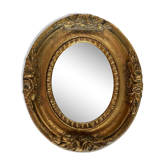 Small old mirror in gilded wood