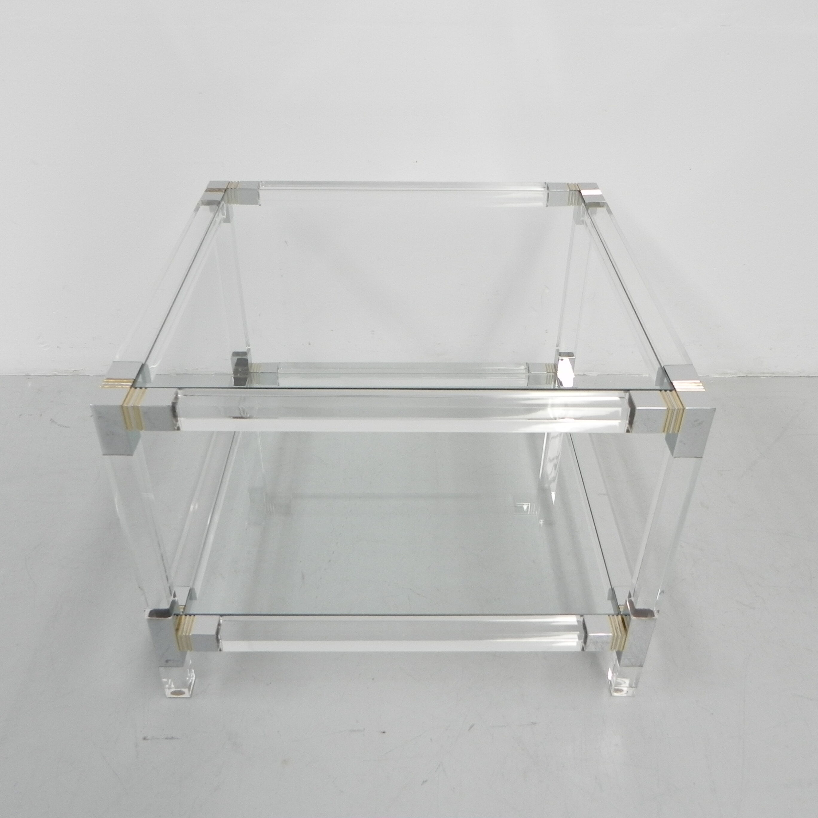 Hollywood Regency coffee table with perspex frame