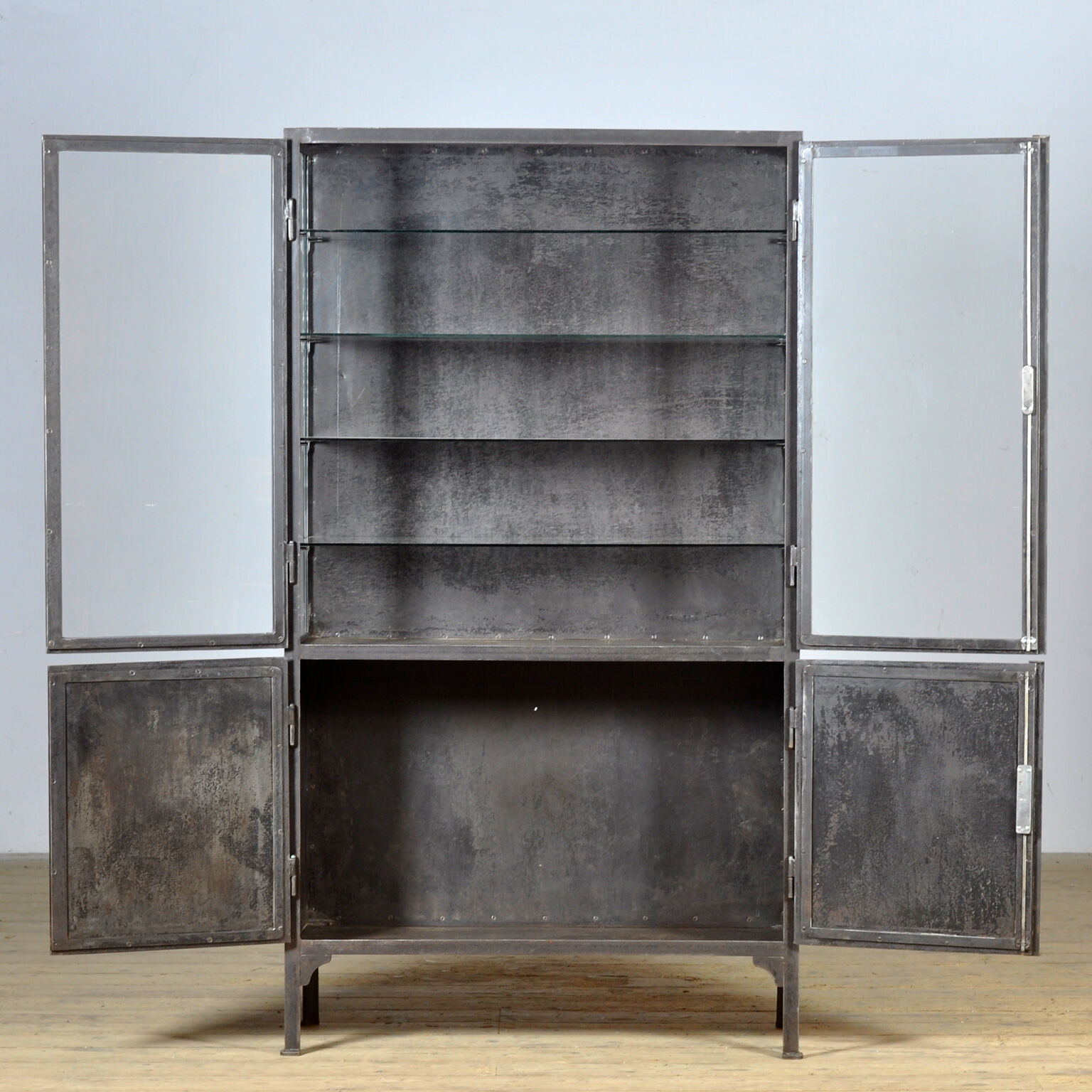 Polished iron medical cabinet, 1930s