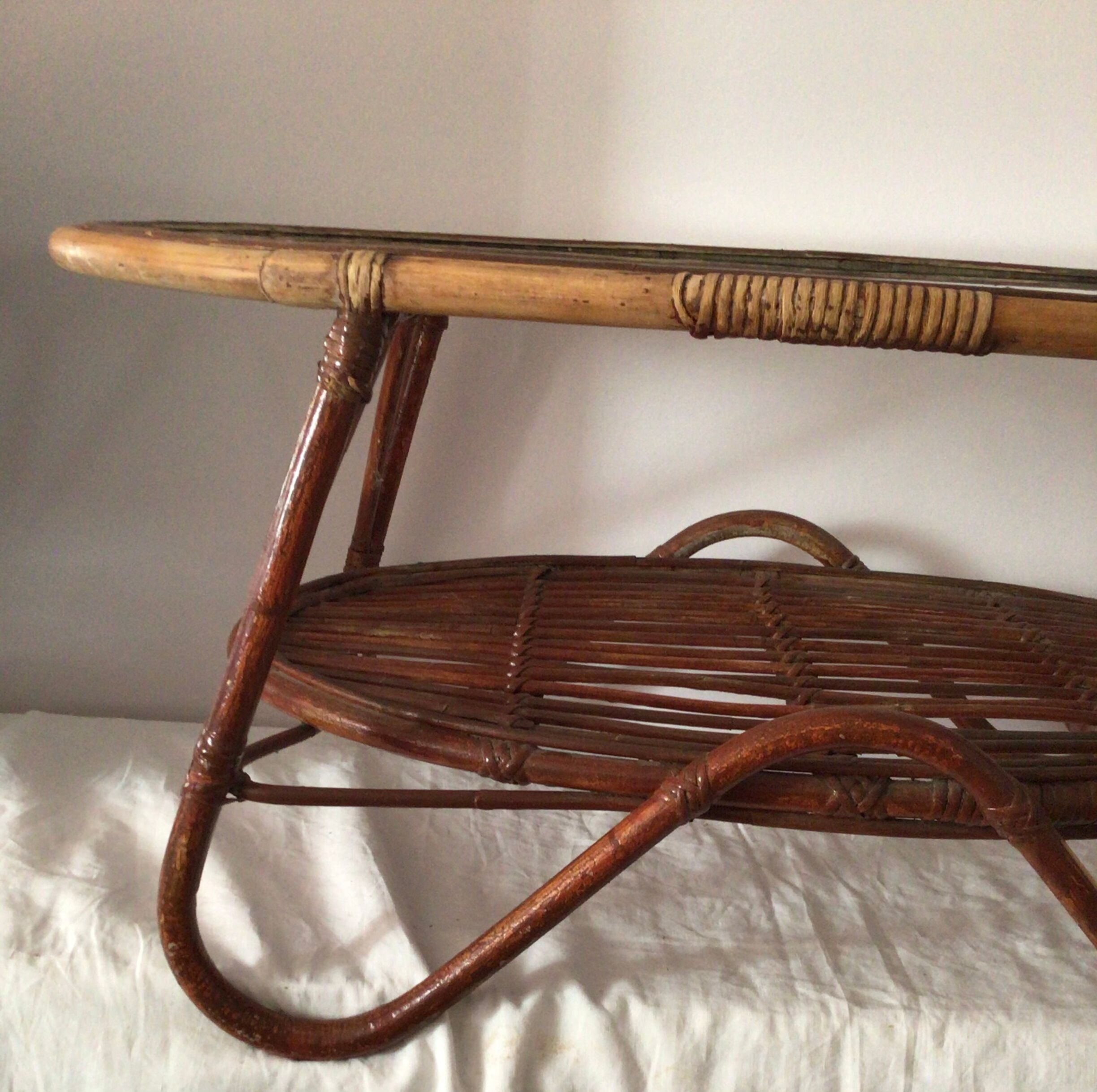 Vintage rattan oval-shaped coffee table