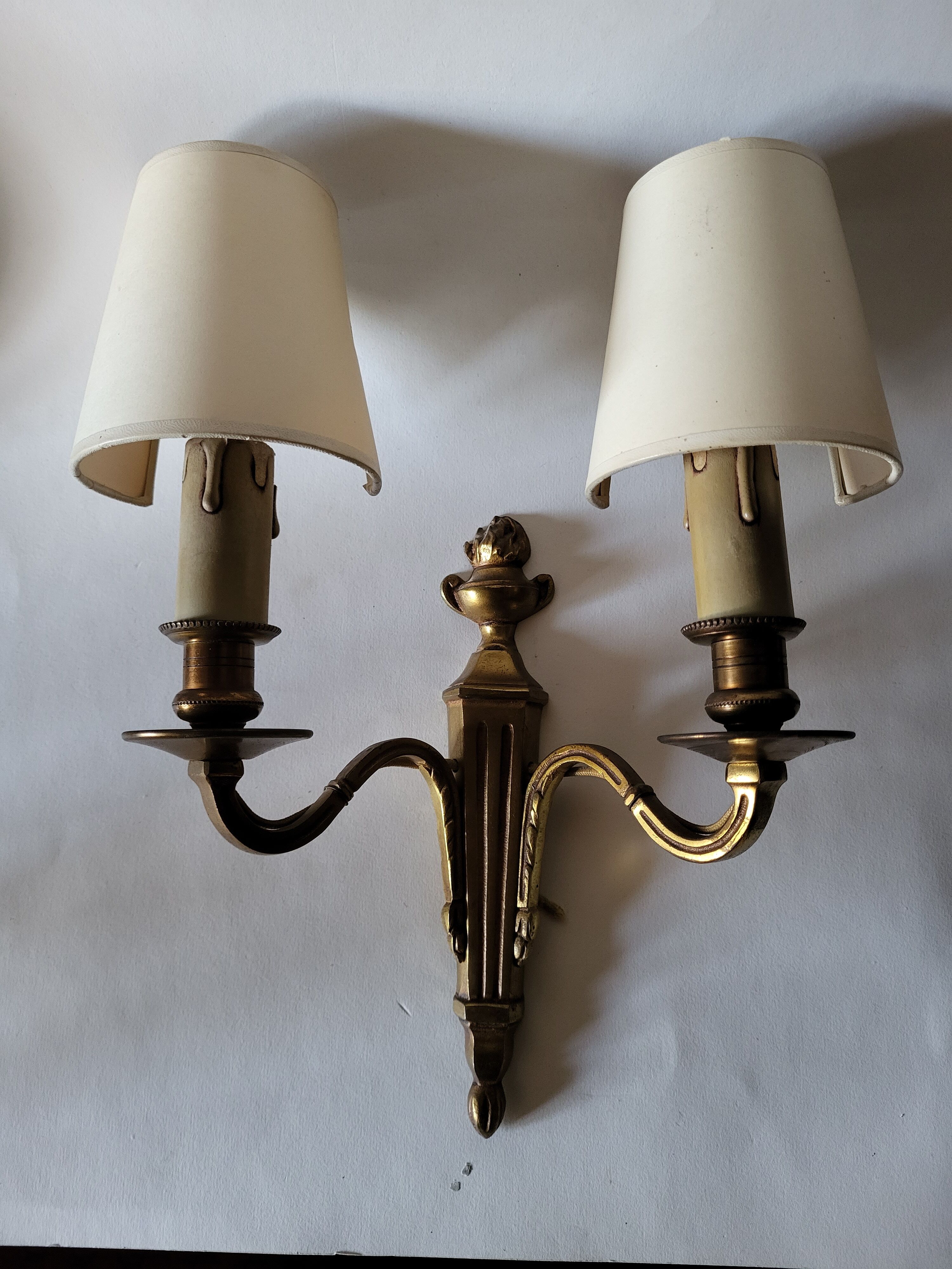 Pair of antique gilded iron wall lamps