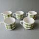 Lot de 5 tasses à café, décor torchon vert, années 70