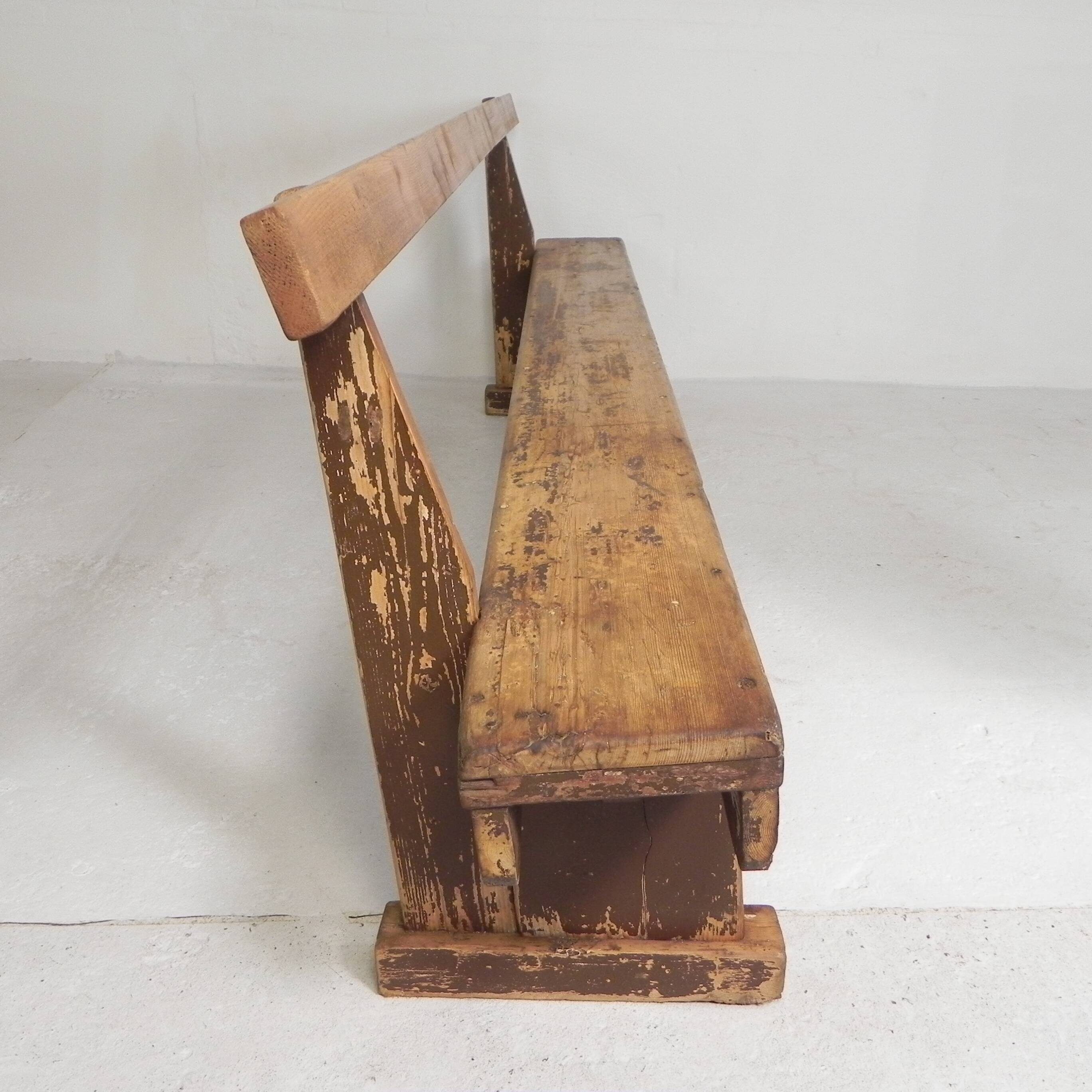 Pine bench with backrest, 2.5 metres long, 1950s.