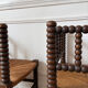 Pair of rush-seated chairs by the fireside "bobbin"