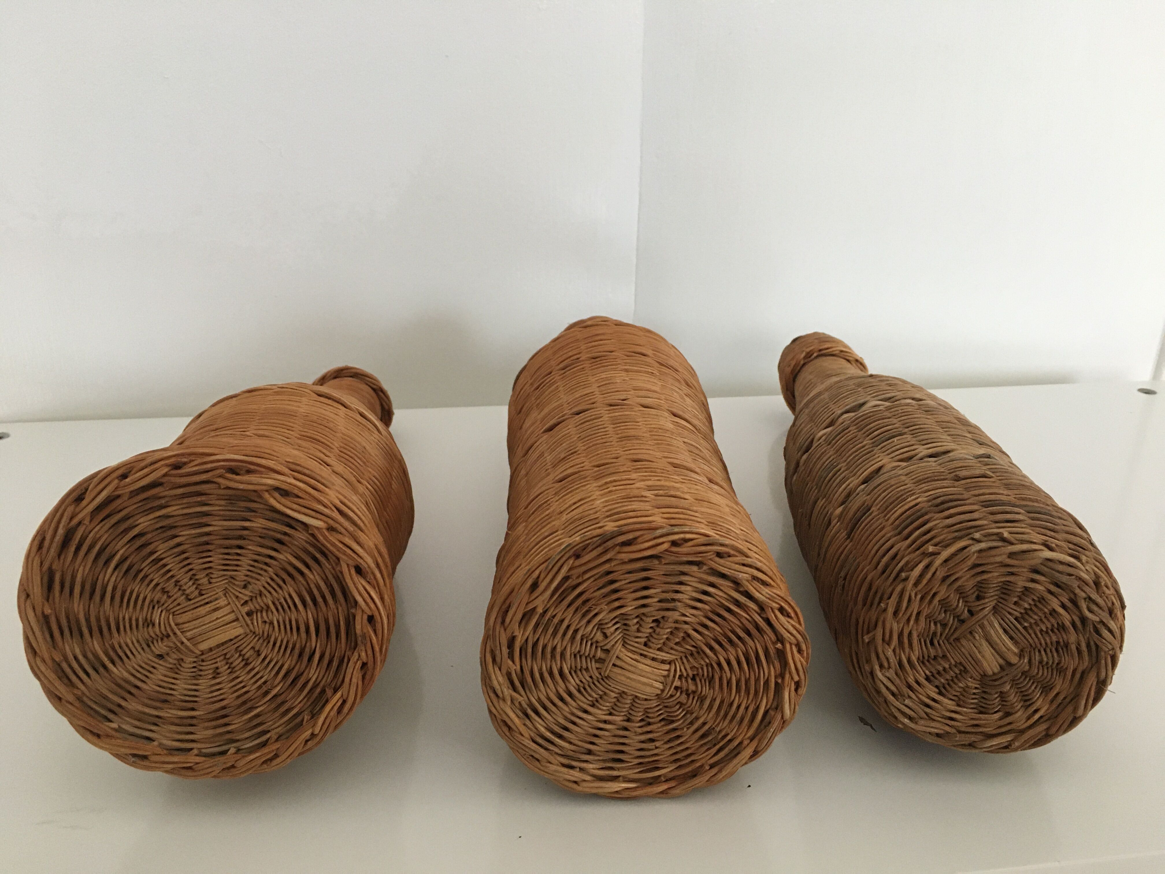 Set of 3 rattan bottles