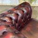 90s red leather Chesterfield armchair