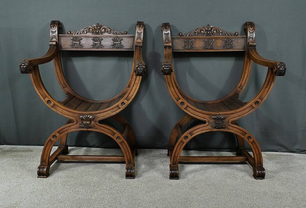Pair of Dagobert walnut armchairs, medieval style – late 19th century