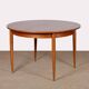 Table de repas ronde et extensible en bois, 1960