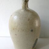 Old bonbonne in glazed stoneware