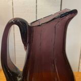 Plum colored glass pitcher