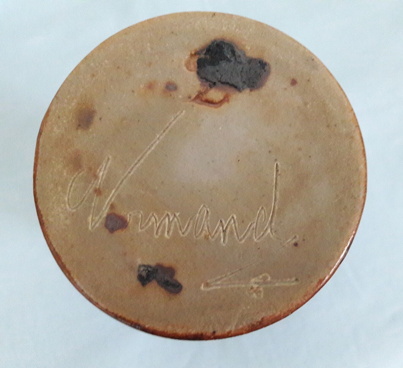 Signed sandstone roll vase