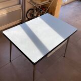 Blue Formica table for 4 to 6 people