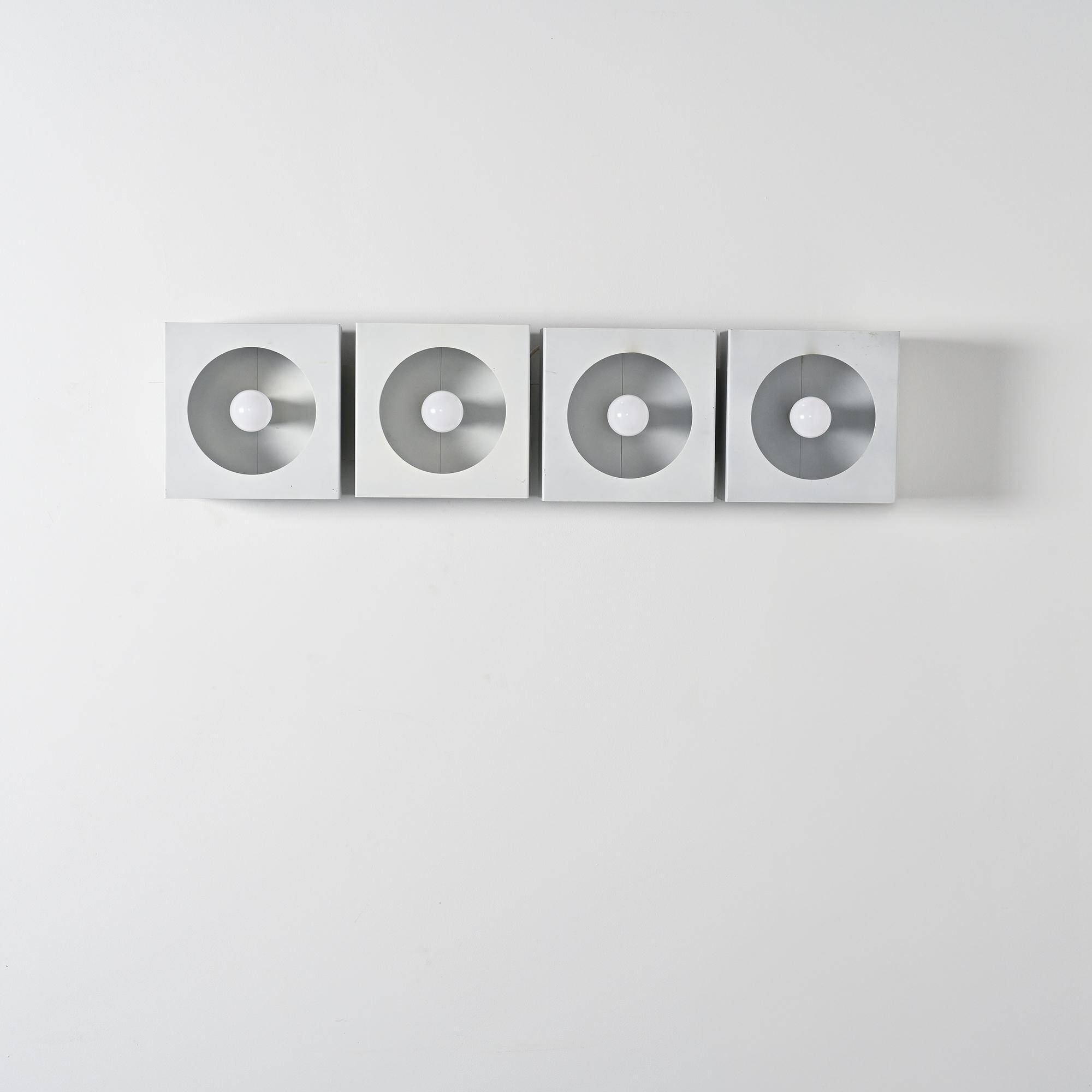 Set of 4 wall lights 2091 by Guy Bertrand for Disderot, circa 1965.
