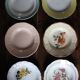 6 mismatched deep plates in floral colours from Digoin, Sarreguemines, Gien.