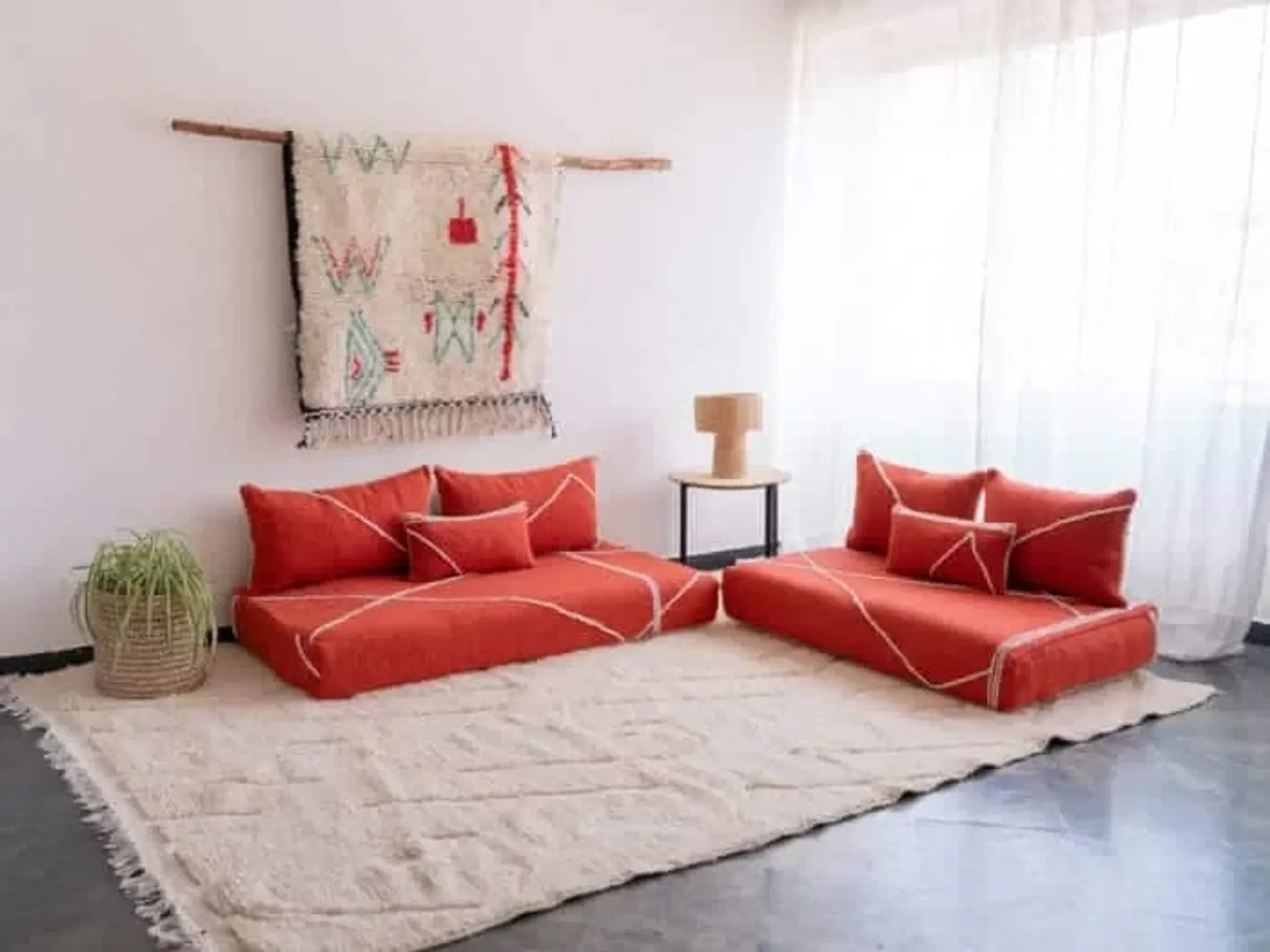 Handmade Moroccan floor cushion in orange cotton.