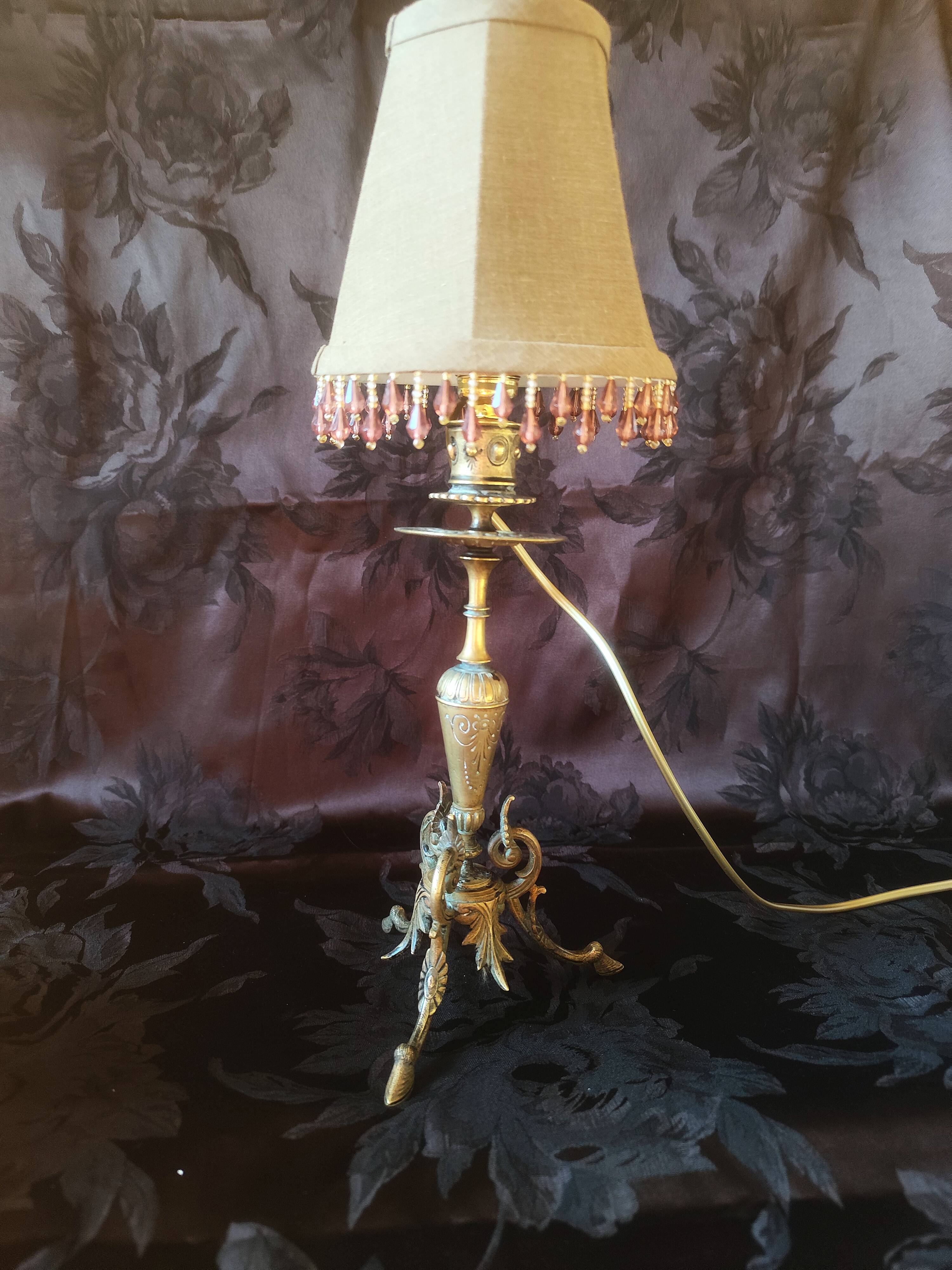Electrified candlestick lamp, bronze tripod table lamp with goat's feet