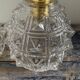 Set of two chiseled glass sconces