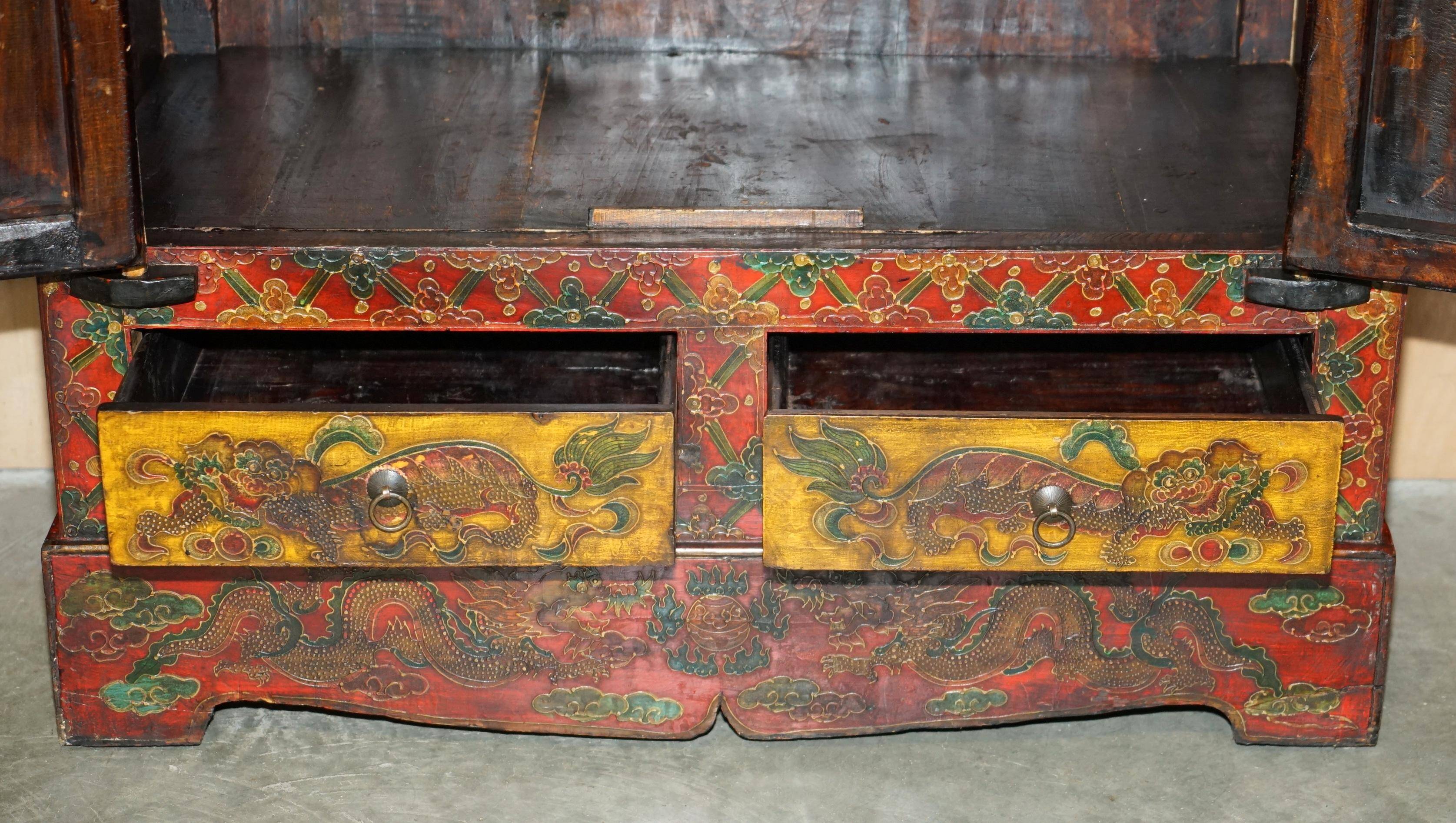 Vintage Chinese wardrobe painted with pagoda and drawers.