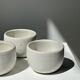 Trio of white ceramic cups D9cm