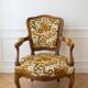 Louis XV armchair in wood and yellow and green floral fabric