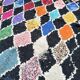Vintage Boucherouite Berber rug: Hand-knotted Moroccan rug.