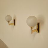 Pair of vintage wall lights in brass and glass from the 70s