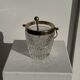 Small golden glass ice bucket with diamond point design and its scoop.