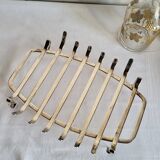 Silver-plated serving dish Quist and its asparagus cradle grid.