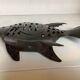 Large metal fish-shaped candle holder