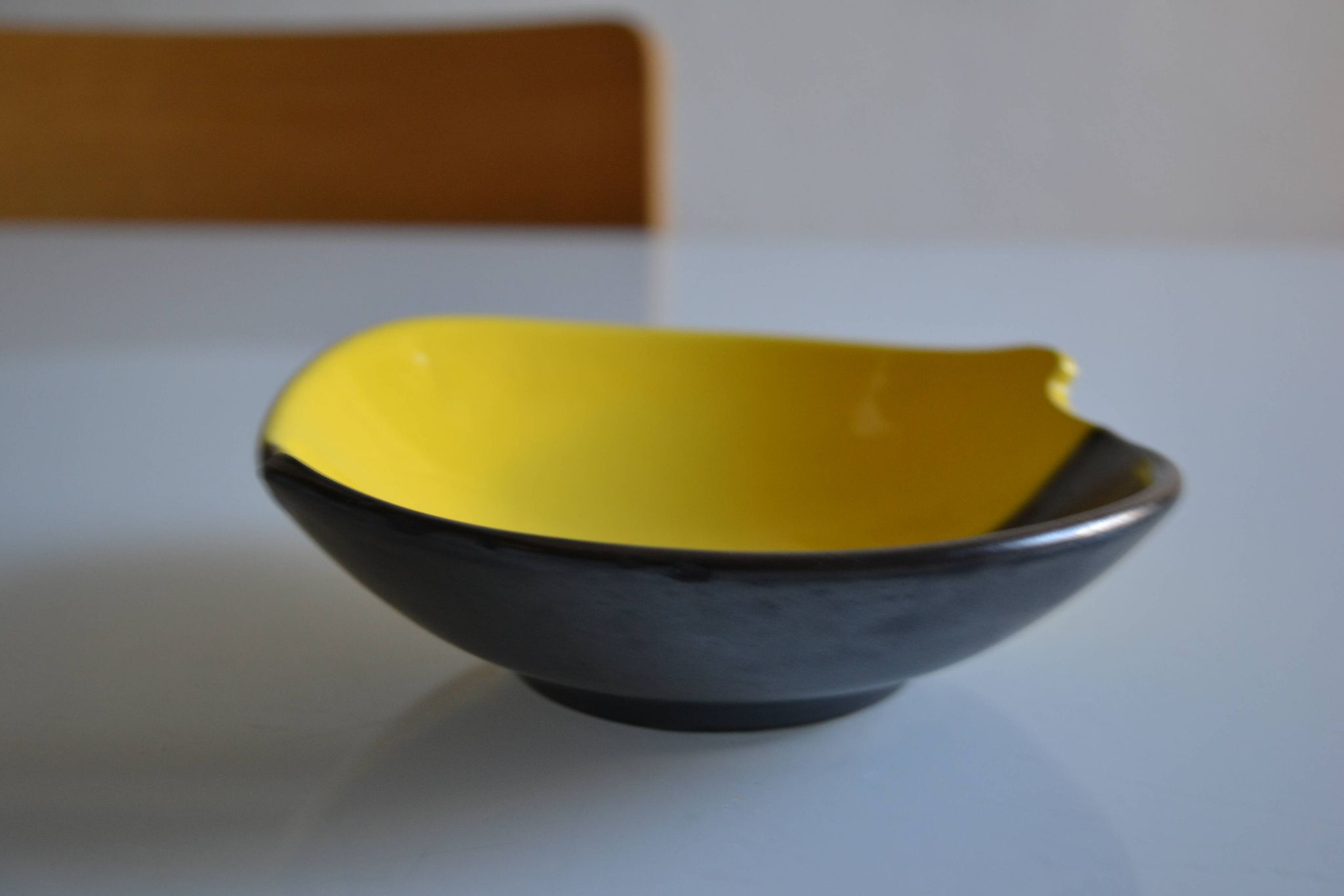 Bicolour ceramic cup in black and yellow signed Luc Vallauris 1950
